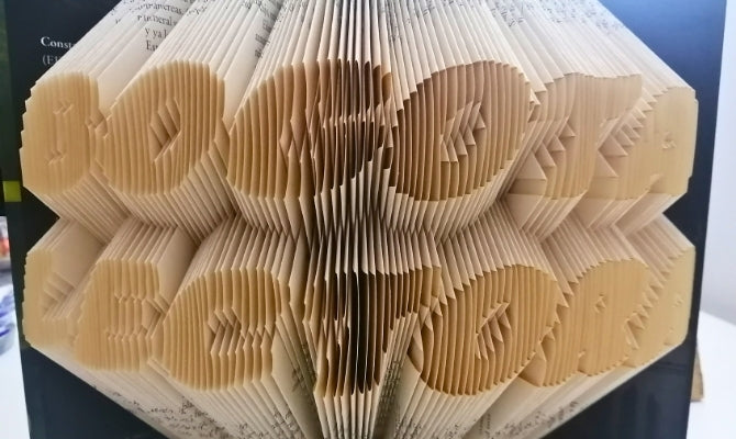 Book Folding: El arte de transformar libros en esculturas de papel